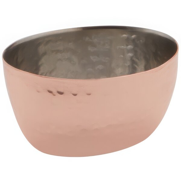 An American Metalcraft stainless steel sauce cup with a hammered copper finish and oval shape.