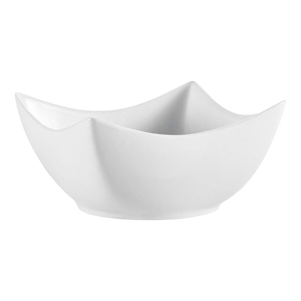 A CAC Super White porcelain bowl with a curved edge.