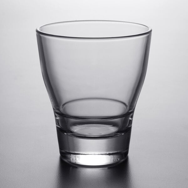 An Arcoroc stackable old fashioned glass on a table.