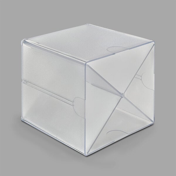 A clear plastic box with a triangle shape inside.