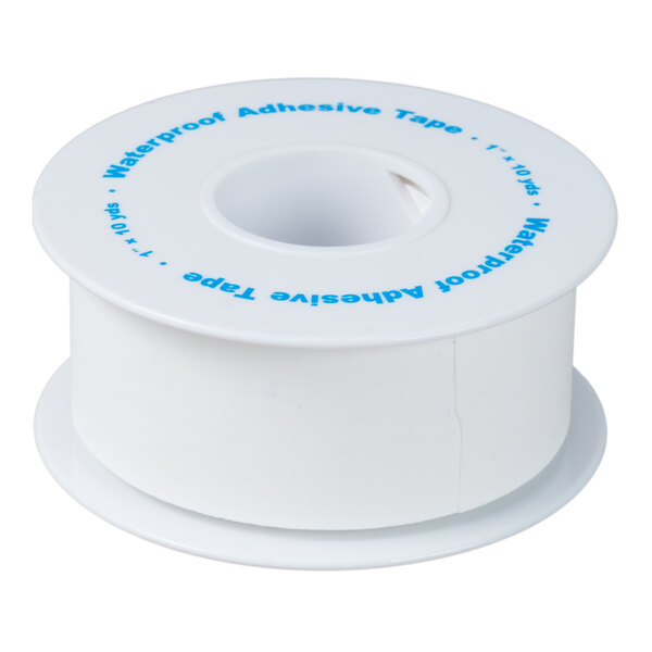 A close-up of a white Medi-First adhesive tape roll with blue writing.