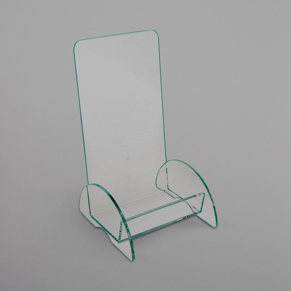 A clear acrylic display stand with curved edges.