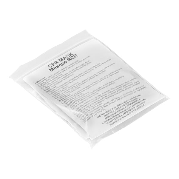 A sealed plastic pouch labeled 'CPR MASK Masque RCR' with printed instructions visible on the front.