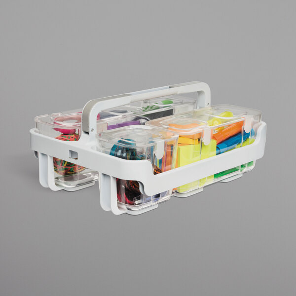 A white Deflecto stackable caddy with clear containers filled with different colored items.