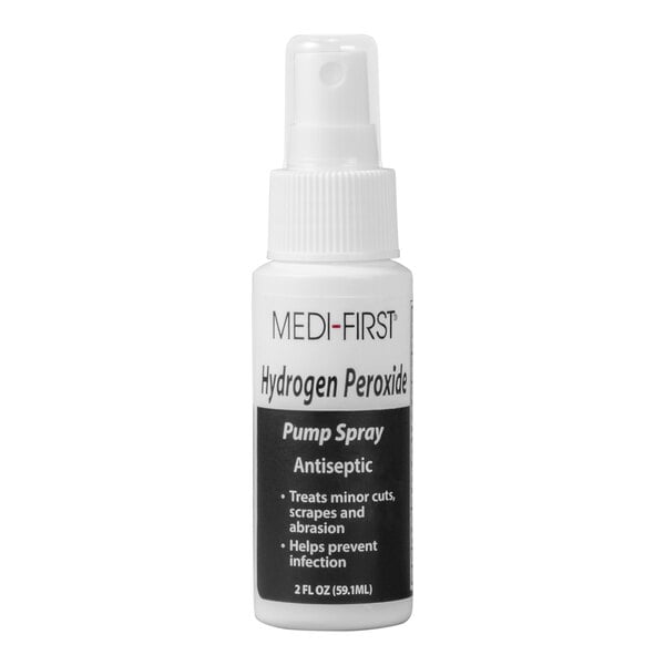 A white bottle of Medi-First hydrogen peroxide pump spray with a black and white label and cap.
