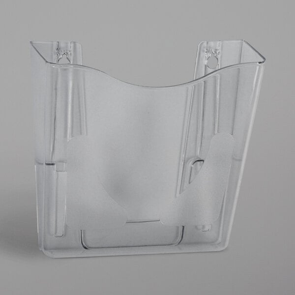 A Deflecto clear plastic wall file holder with holes for mounting.