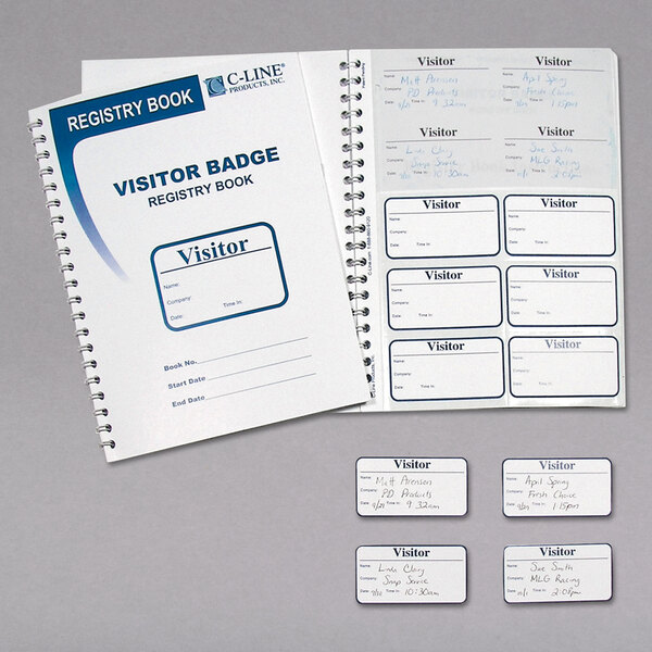 A C-Line visitor registry log book with name tags.