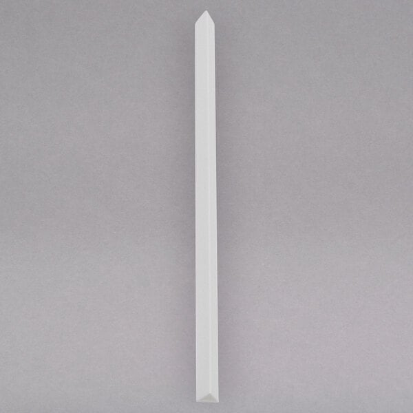 a white post with a pointy tip