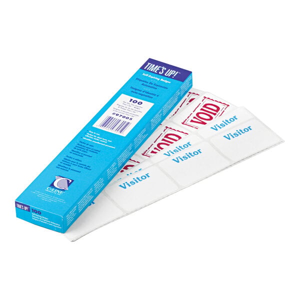 A box of self-expiring adhesive visitor badges with visible labels reading 'Visitor' in blue and 'VOID' in red.