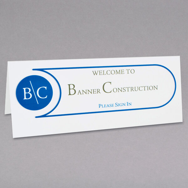 A white C-Line tent card with blue text.