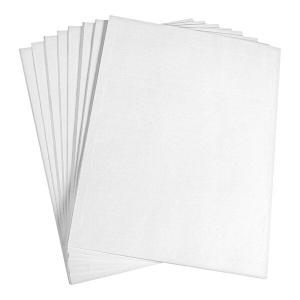 A stack of blank white rectangular sheets arranged in a fanned-out manner.