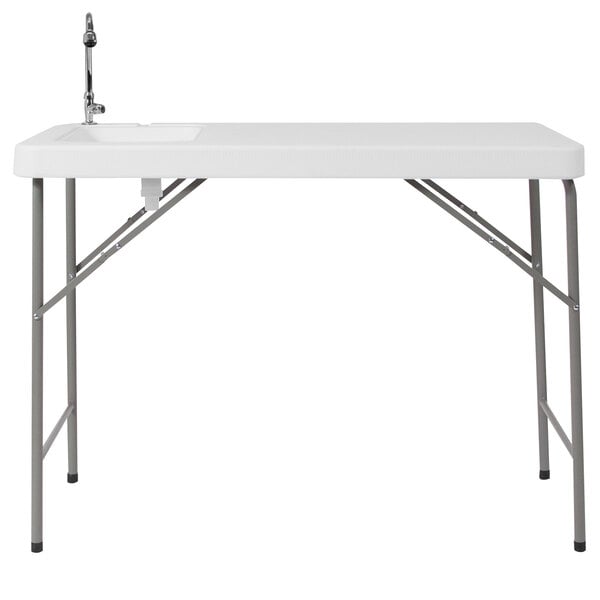 A Flash Furniture white rectangular folding table with a sink and faucet.