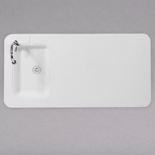 a white rectangular object with a hole in it