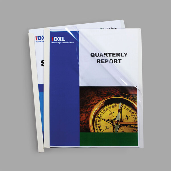 A stack of papers in a clear C-Line report cover with a binding bar.