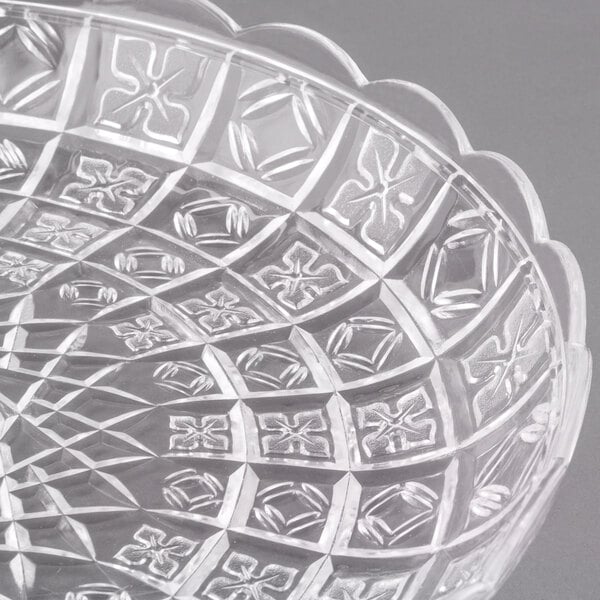 A Fineline crystal plastic catering platter with a pattern on it.