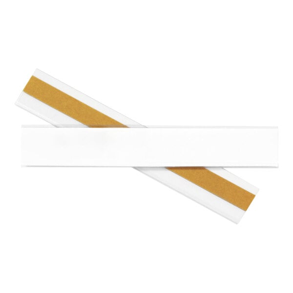 A close up of a white rectangular label holder with clear plastic and yellow paper inside.