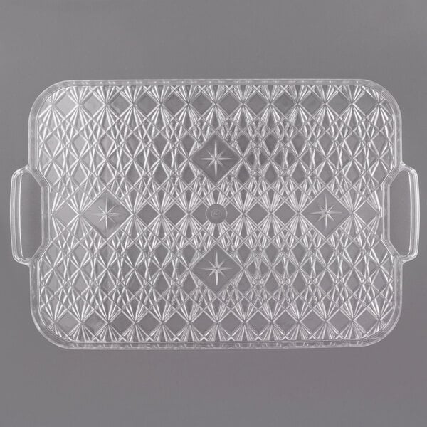 A Fineline clear plastic catering tray with a geometric design.