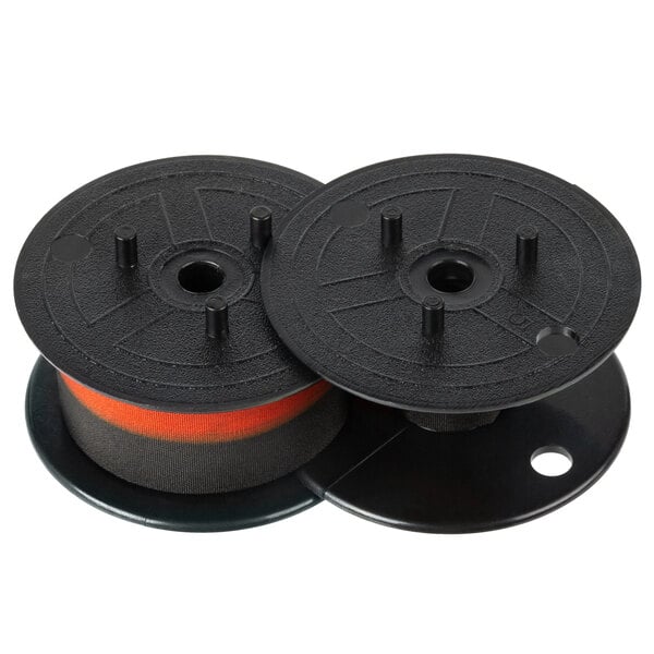 Two black and orange Point Plus calculator spools.