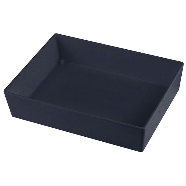 A black rectangular Tablecraft bowl with blue speckles on a table.