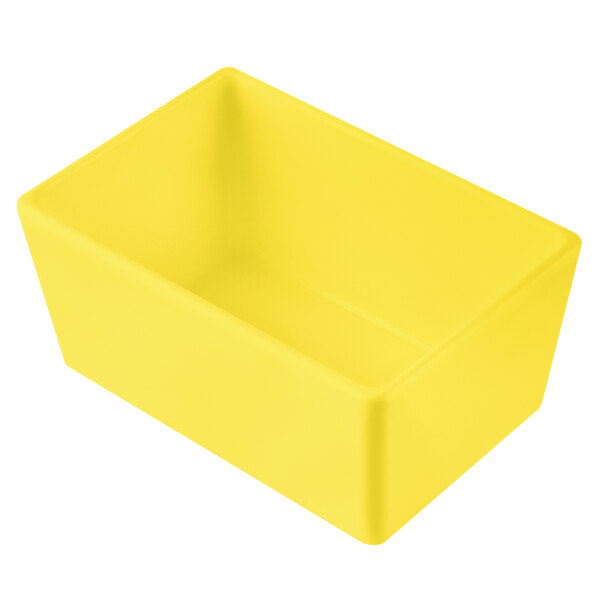 A yellow rectangular Tablecraft bowl with a white background.