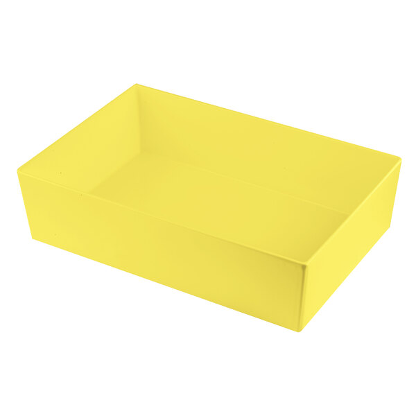 A yellow cast aluminum deep bowl with straight sides.