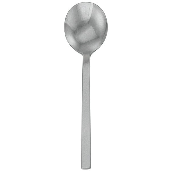 A Walco stainless steel bouillon spoon with a long handle and a fieldstone finish.