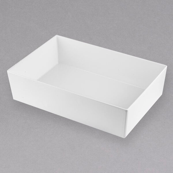 A white rectangular Tablecraft cast aluminum bowl.