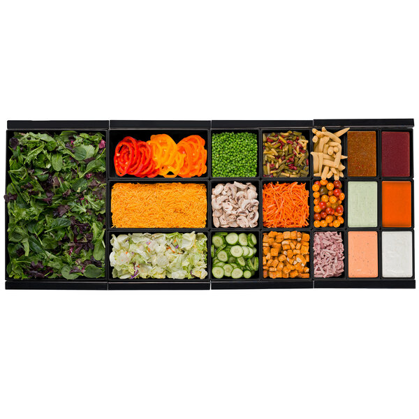 A Tablecraft black cast aluminum bowl filled with a variety of vegetables.