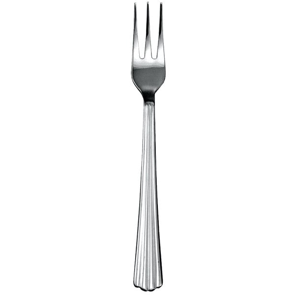 A Walco stainless steel cocktail fork with a silver handle.