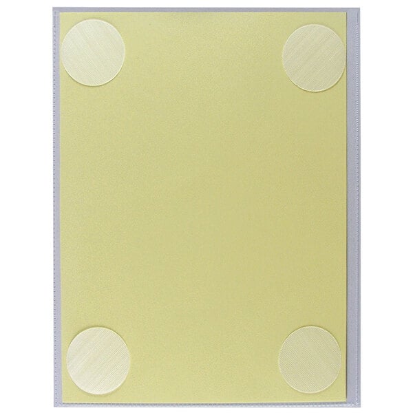 A C-Line clear rectangular display with yellow paper and white circles inside.