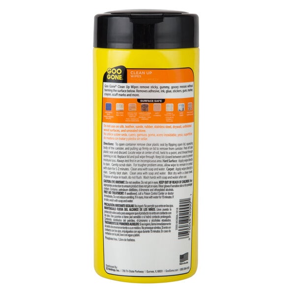 A yellow package of Goo Gone Clean Up Wipes with a black lid.