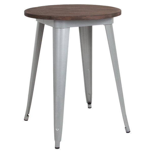A Flash Furniture round dining table with a walnut top and silver metal frame.