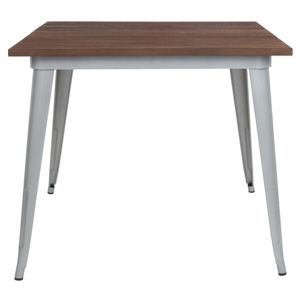 A Flash Furniture square dining table with a wooden top and metal legs.