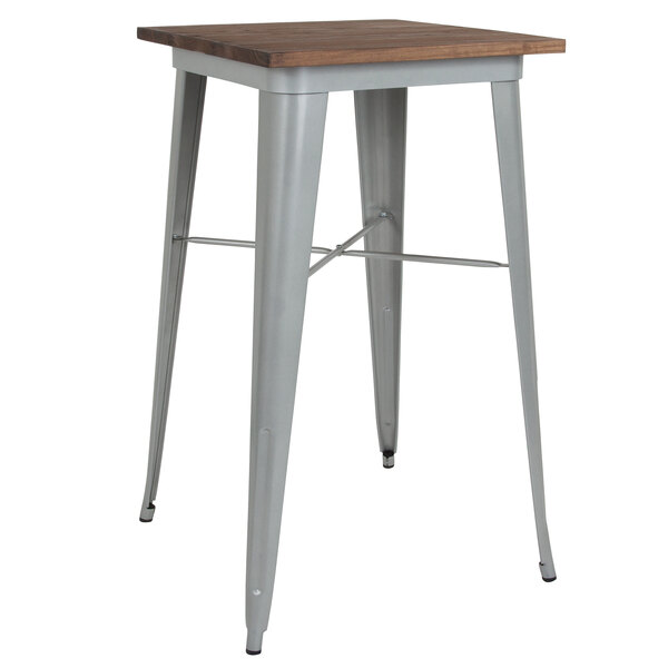 A Flash Furniture bar height table with a silver metal frame and wood top.
