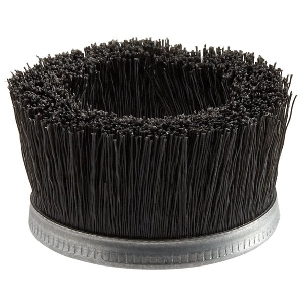 A round black brush with a silver metal rim.