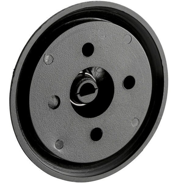 a black round object with holes