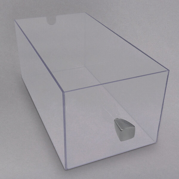 A clear acrylic drawer with a silver metal handle.