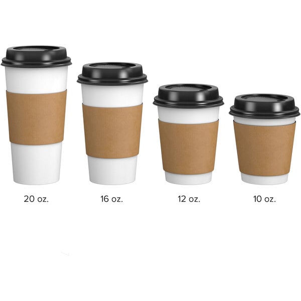 A white paper coffee cup with a brown sleeve and black lid.