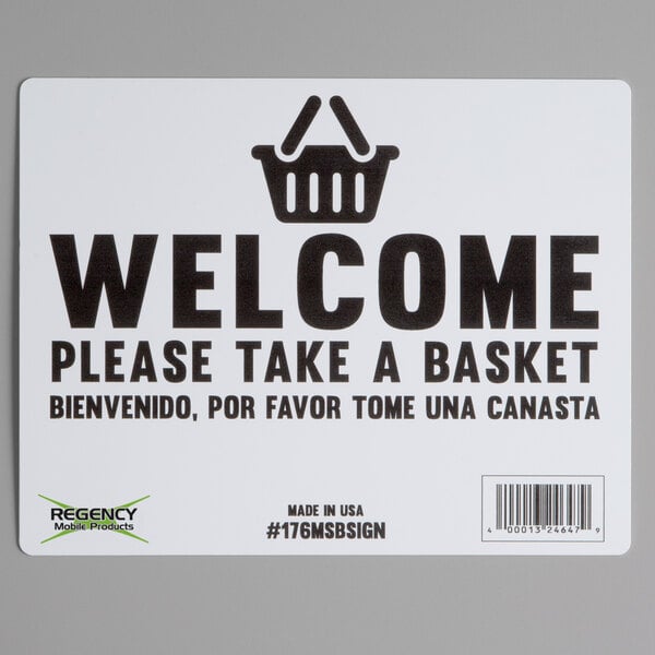 A white sign with black text that says "Welcome Please Take a Basket" for a Regency shopping basket stand.