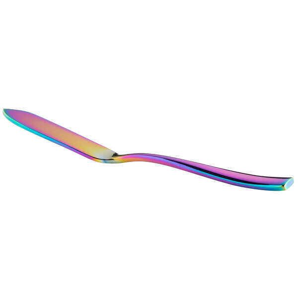 a rainbow colored spoon on a white background