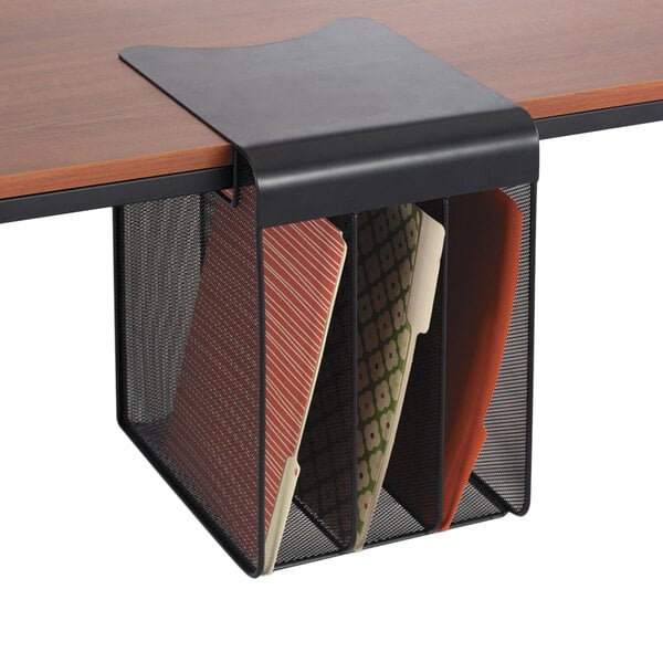 A black Safco vertical hanging file holder with file folders inside.