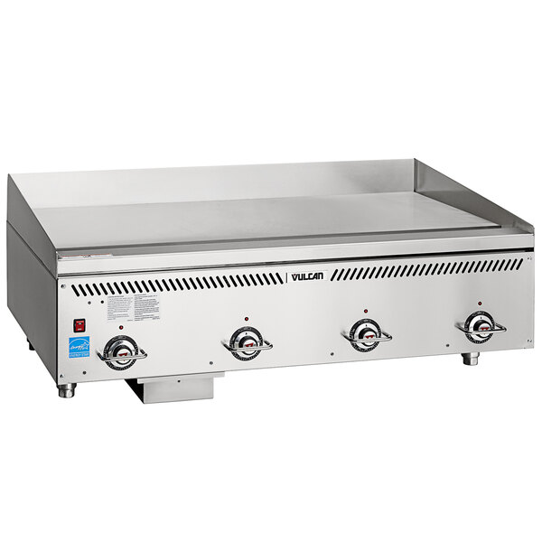 A large stainless steel Vulcan liquid propane griddle on a counter.