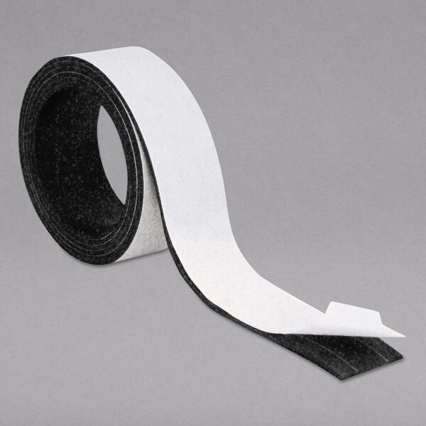 a roll of tape with a black and white strip