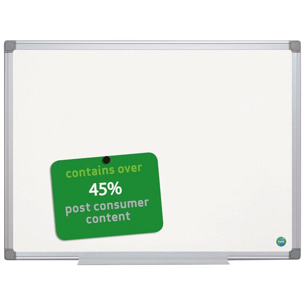 A MasterVision whiteboard with a green sign on it.