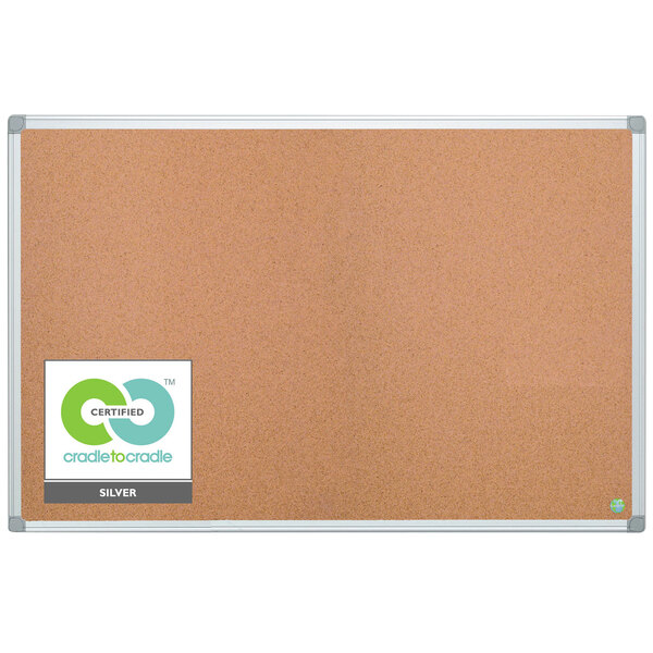 A MasterVision cork board with a white aluminum frame.