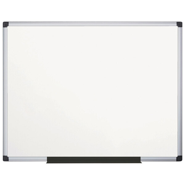 A white board with a silver frame.