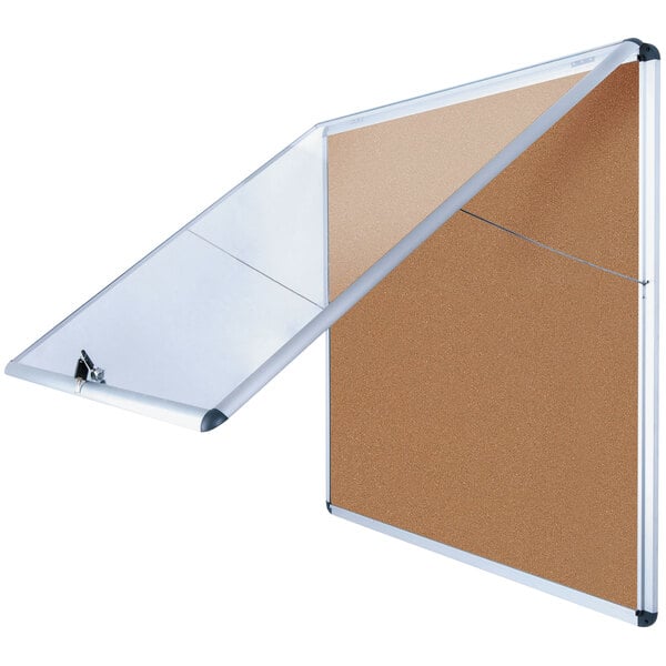 A MasterVision slim-line cork bulletin board with aluminum case. A cork board with a clear plastic cover.