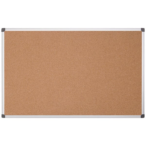 A MasterVision cork board with an aluminum frame.