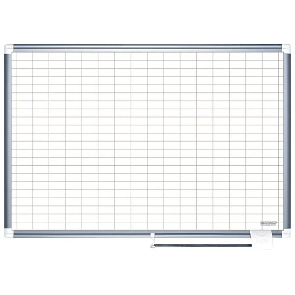 A MasterVision whiteboard with a grid on it.