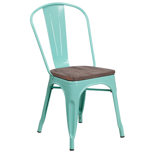 A mint green metal restaurant chair with a wood seat and vertical slat back.